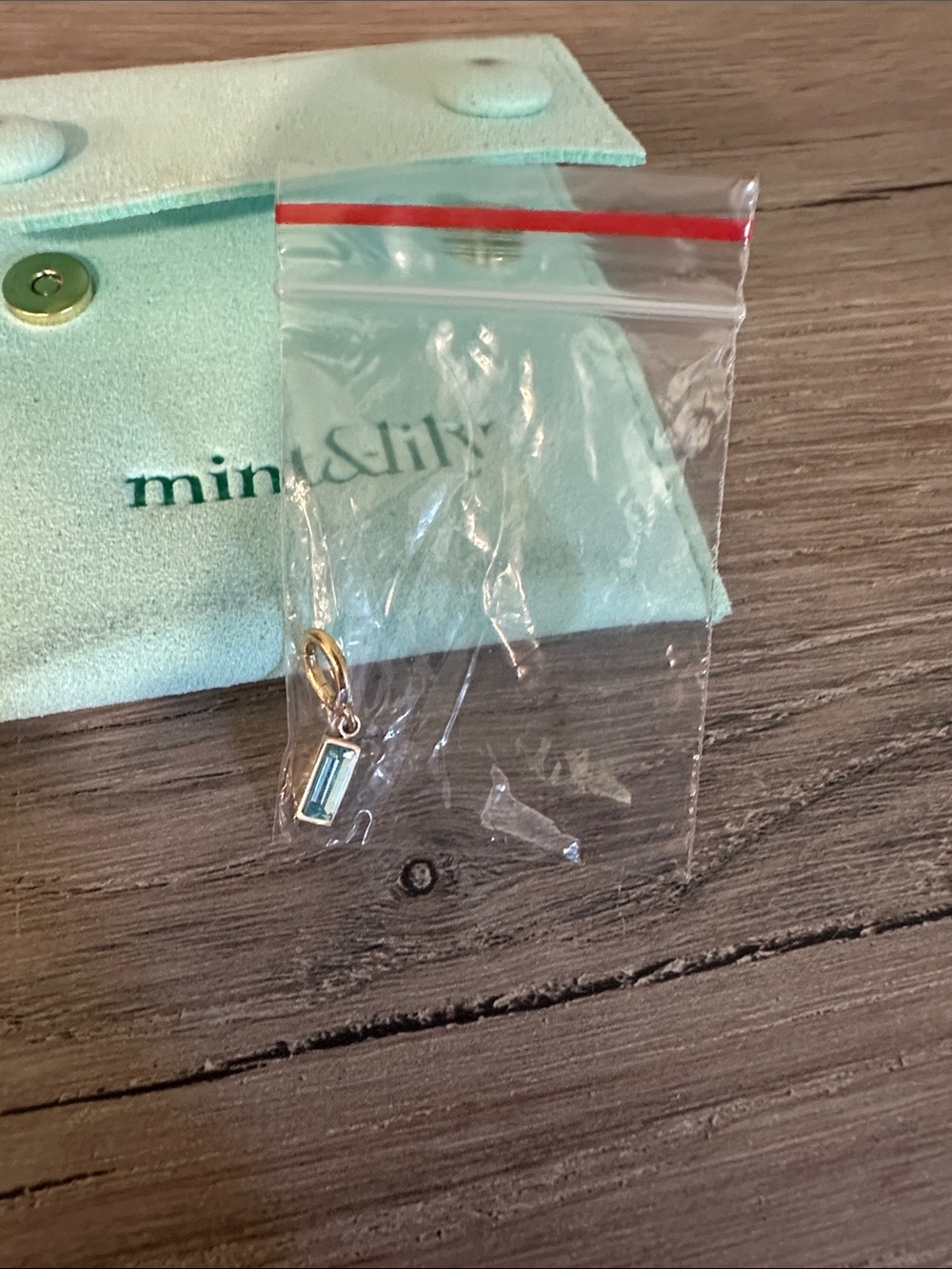 mint & lily Gold Baguette Pendant with Light Blue Stone